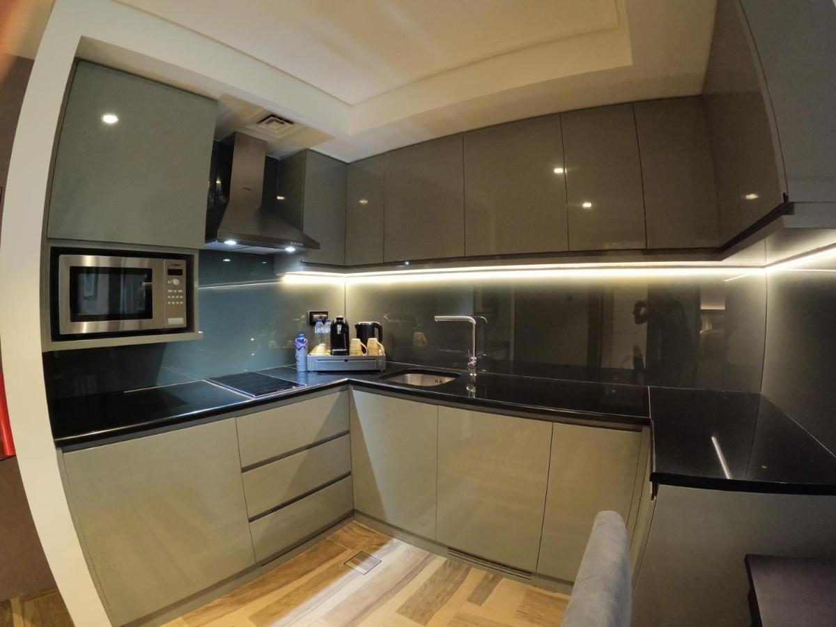 Khalidia Palace Hotel Dubai By Mourouj Gloria Exterior foto A modern kitchen