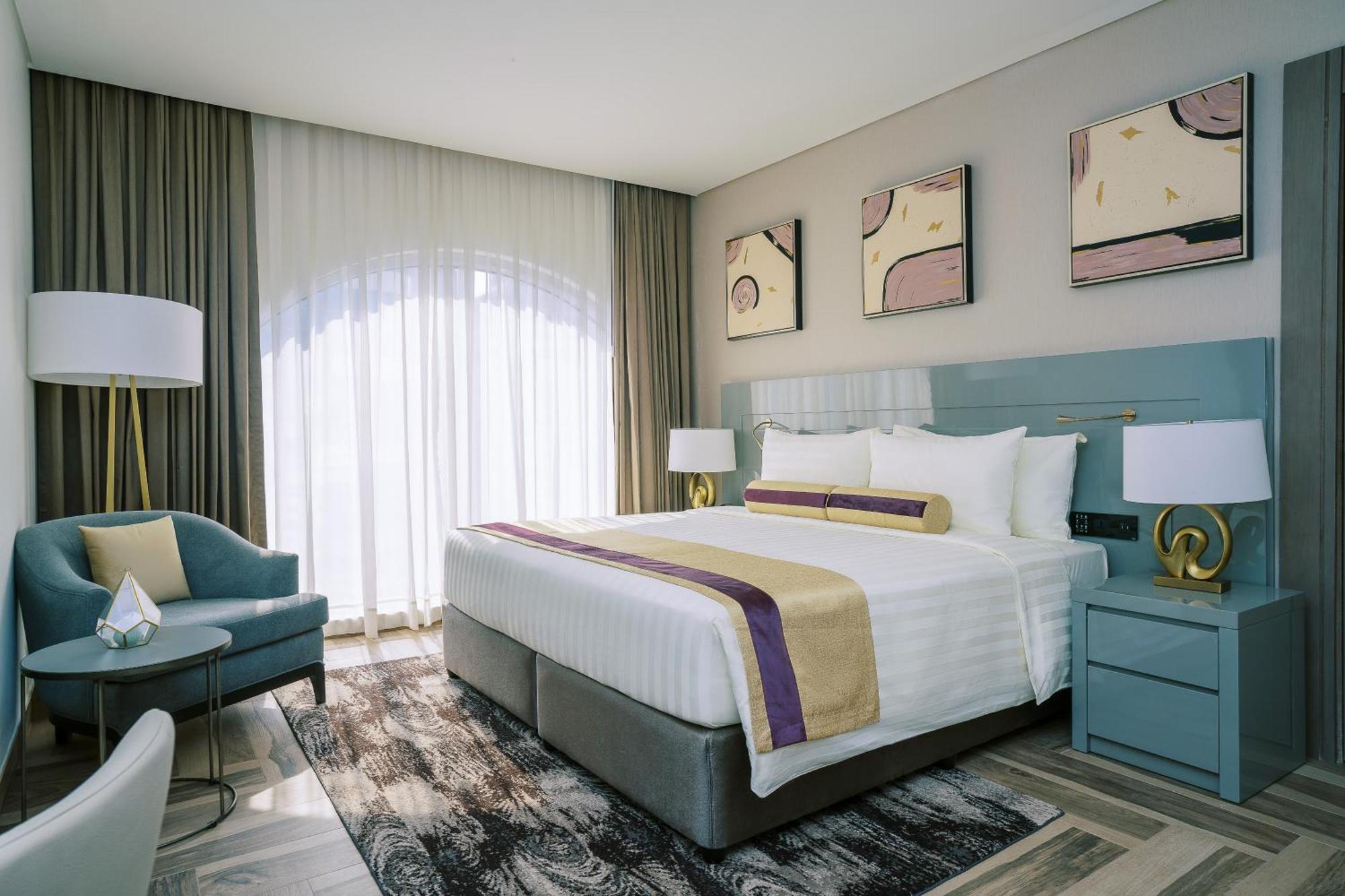 Khalidia Palace Hotel Dubai By Mourouj Gloria Exterior foto A bedroom at the hotel