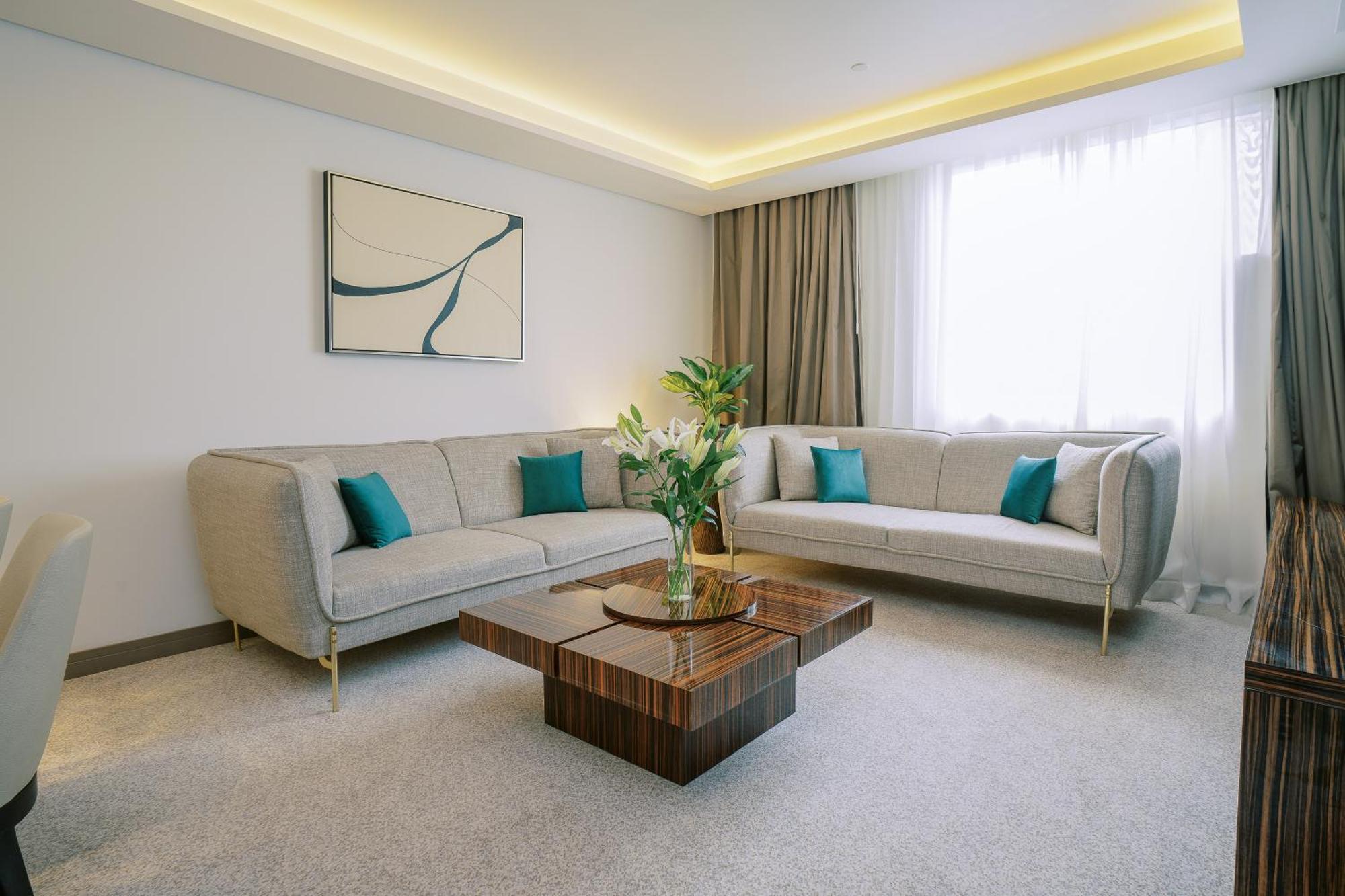Khalidia Palace Hotel Dubai By Mourouj Gloria Exterior foto A living room