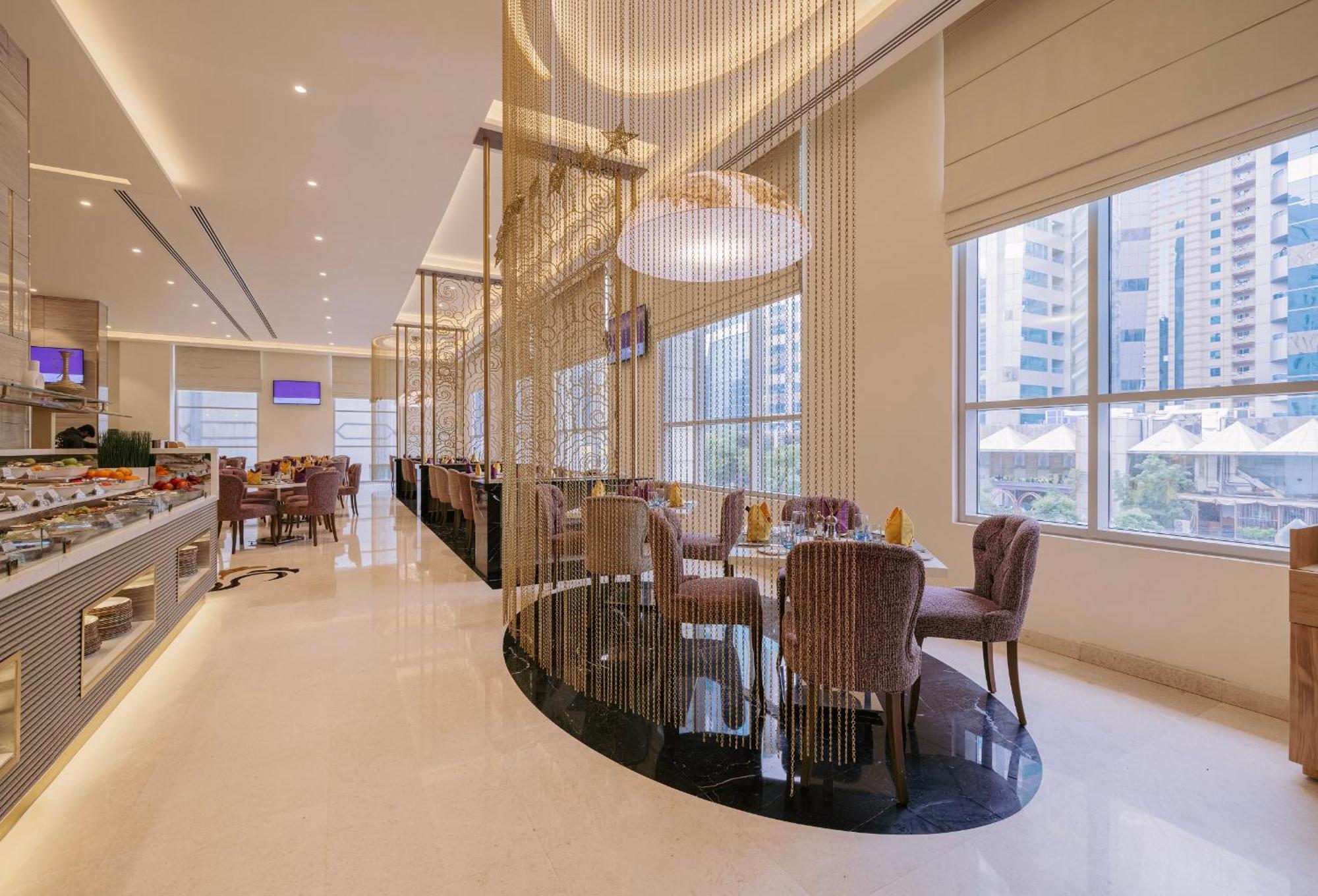 Khalidia Palace Hotel Dubai By Mourouj Gloria Exterior foto The restaurant